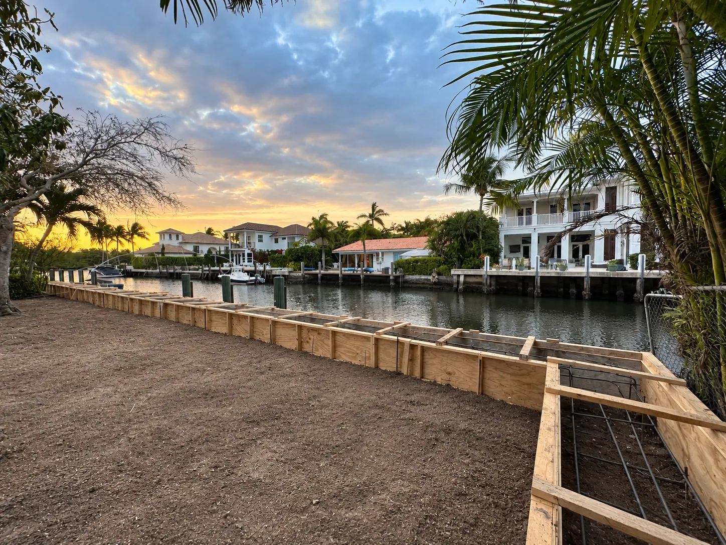 Foam Guys barge crew installing a seawall at a waterfront property